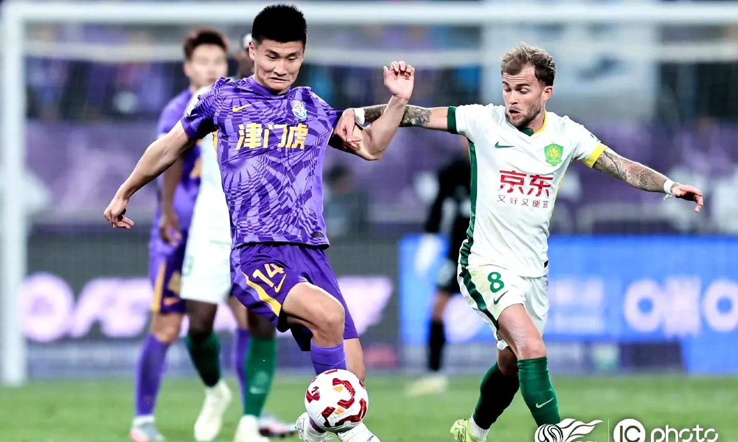 北京国安客场不敌广州富力，争夺亚冠资格